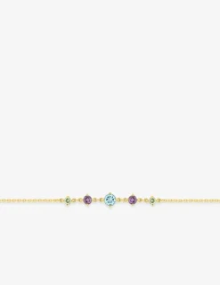 Bracelet en or jaune 750 ‰ avec topaze bleue et autres pierres SO OR