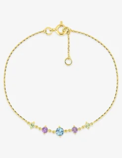 Bracelet en or jaune 750 ‰ avec topaze bleue et autres pierres SO OR