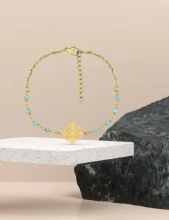 Bracelet fantaisie cristal turquoise, acier doré et motif SO OR