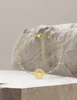 Bracelet fantaisie cristal turquoise, petite chaîne en acier doré et motif SO OR