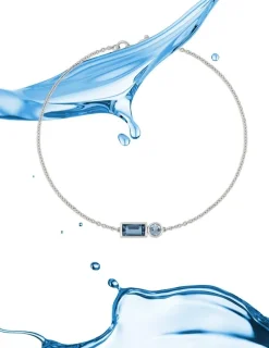 Bracelet fantaisie or blanc 750 ‰ topaze bleue traitée SO OR