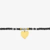 Bracelet élastique cristal noir et motif cœur acier doré SO OR
