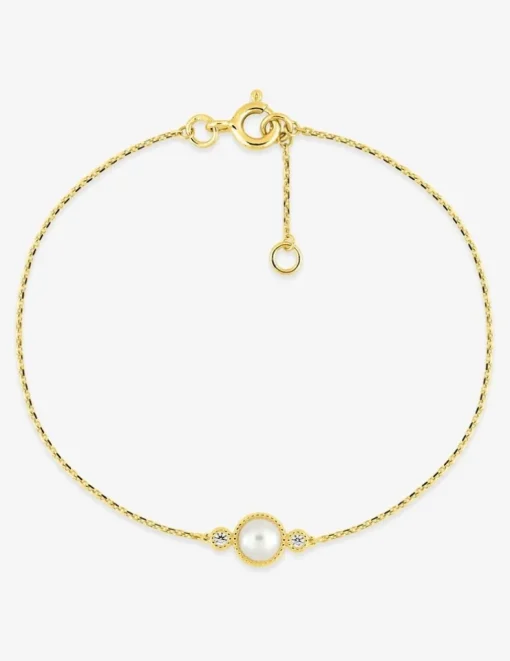 Bracelet or jaune 750 ‰ diamant 0,03 ct et perle de culture d'eau douce SO OR