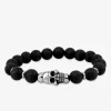 Bracelet pierres de lave, motif tête de mort en acier SO OR
