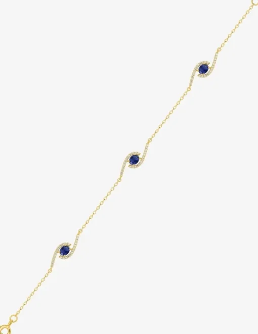 Bracelet plaqué or, rhodium et oxydes de zirconium blancs et bleu foncé SO OR