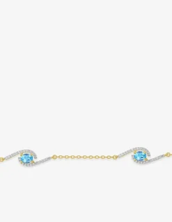 Bracelet plaqué or, rhodium et oxydes de zirconium blancs et bleus SO OR