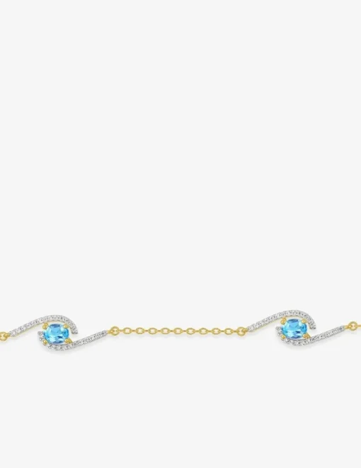 Bracelet plaqué or, rhodium et oxydes de zirconium blancs et bleus SO OR