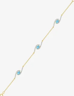 Bracelet plaqué or, rhodium et oxydes de zirconium blancs et bleus SO OR