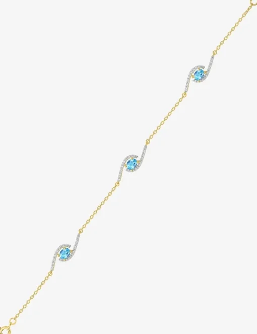 Bracelet plaqué or, rhodium et oxydes de zirconium blancs et bleus SO OR
