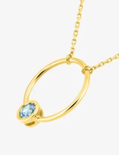 Collier cercle en or jaune 375‰ et topaze bleue SO OR