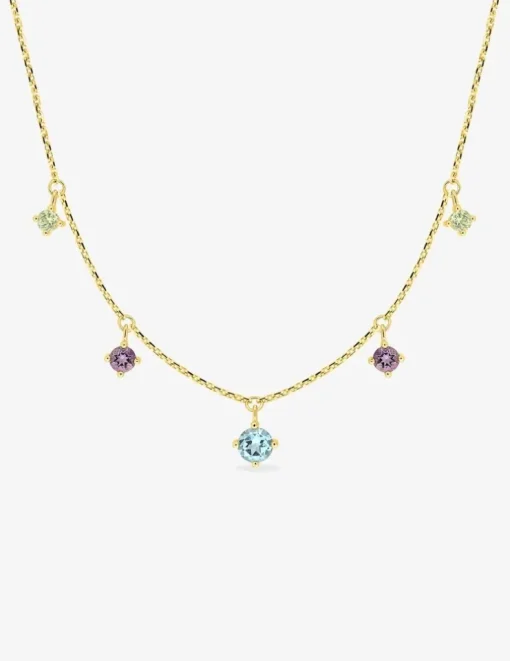 Collier en or jaune 750 ‰, topaze bleue et autres pierres SO OR