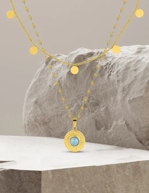 Collier fantaisie double, acier doré, motif pendants et cristal bleu synthétique SO OR