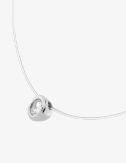 Collier fil nylon or blanc 375‰ et oxyde de zirconium serti clos SO OR