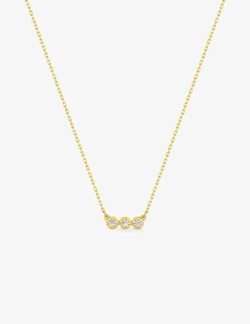 Collier or jaune 750‰ et trilogie oxydes de zirconium SO OR