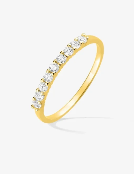 Demi-alliance or jaune 375‰ et oxydes de zirconium 0,26 ct sertis griffes SO OR