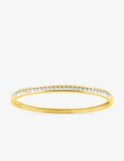 Jonc ouvrant plaqué or et oxydes de zirconium serti rail SO OR