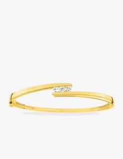 Jonc ouvrant plaqué or et trilogie d’oxydes de zirconium SO OR