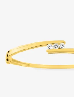 Jonc ouvrant plaqué or et trilogie d’oxydes de zirconium SO OR