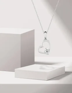 Pendentif cœur or blanc 375 ‰ et oxyde de zirconium quatre griffes SO OR